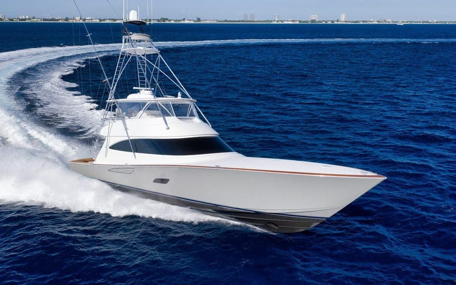 Sportfishing yacht running shot near Palm Beach Inlet