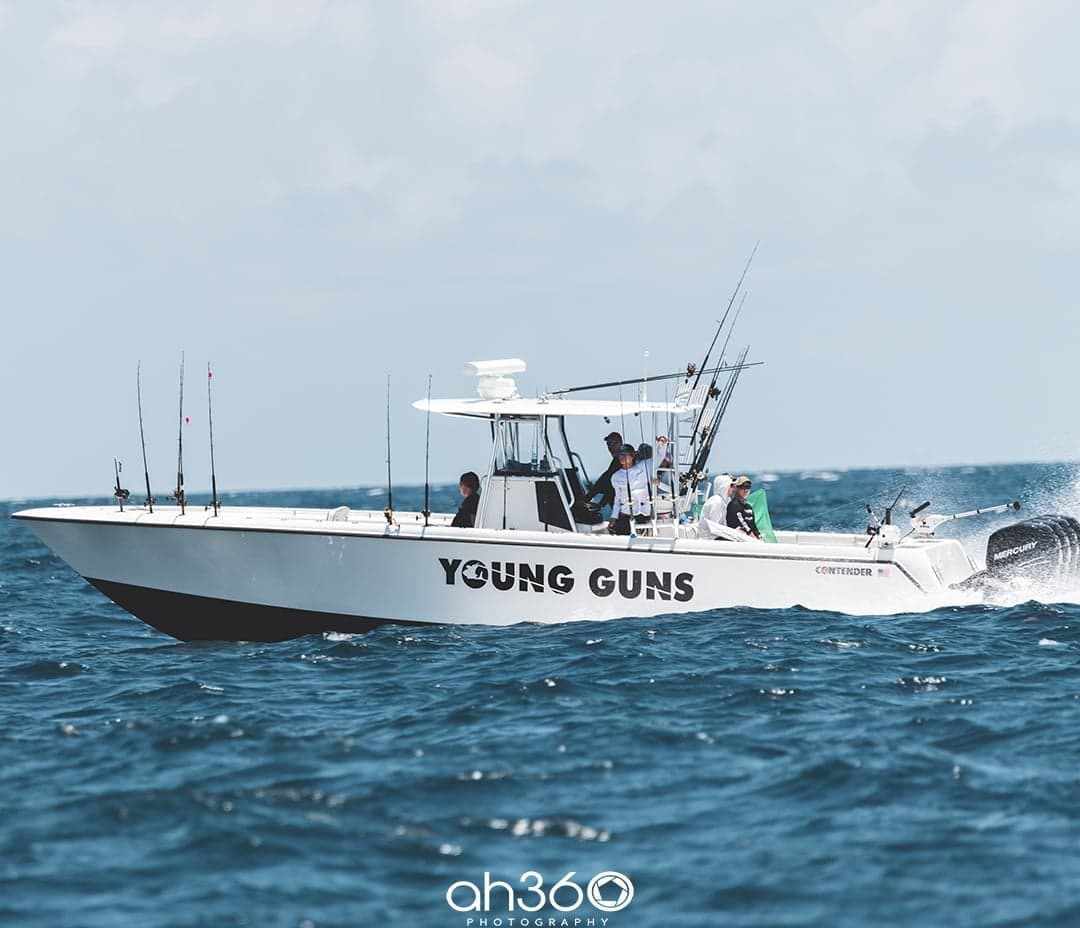 Young Guns fishing team in a Contender sportfishing boat