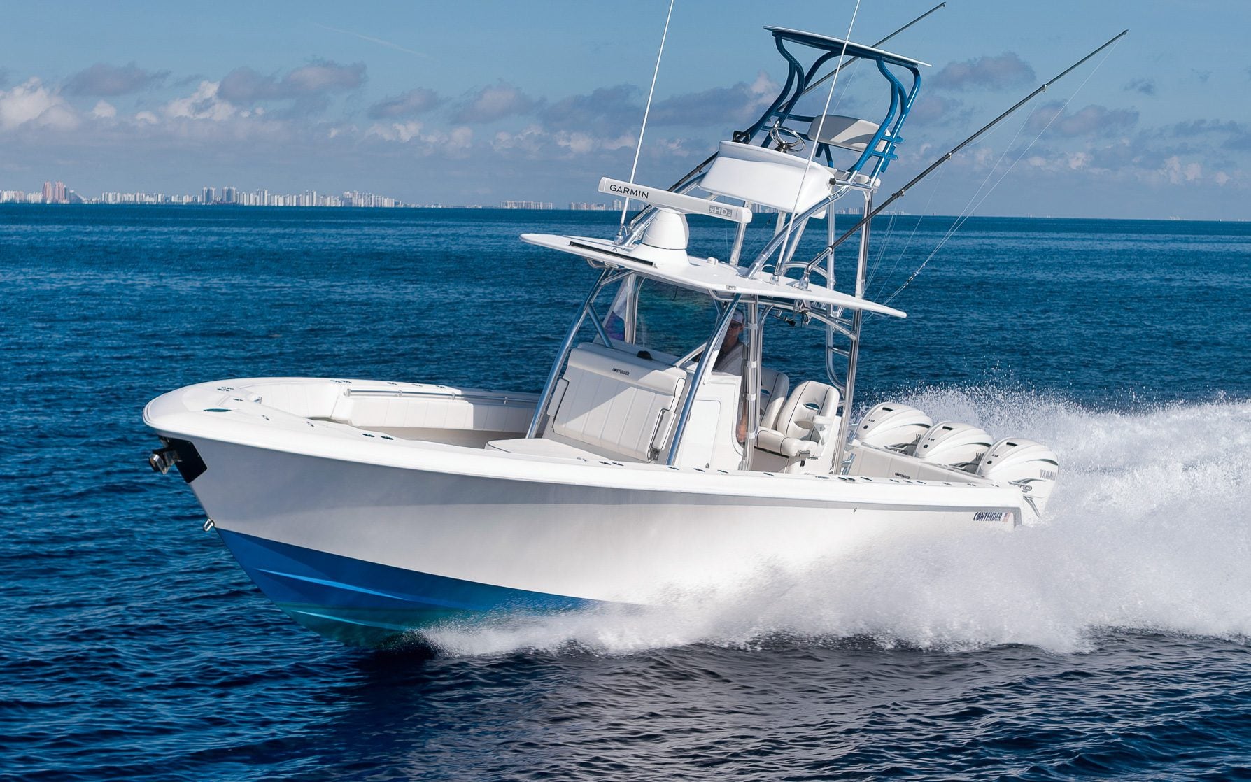 Professional aerial boat photography of a high-speed offshore fishing boat running in South Florida waters