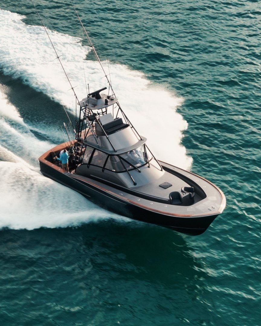 High-speed action yacht photography of Jichi sportfish boat at full speed with bow break - Professional marine photography