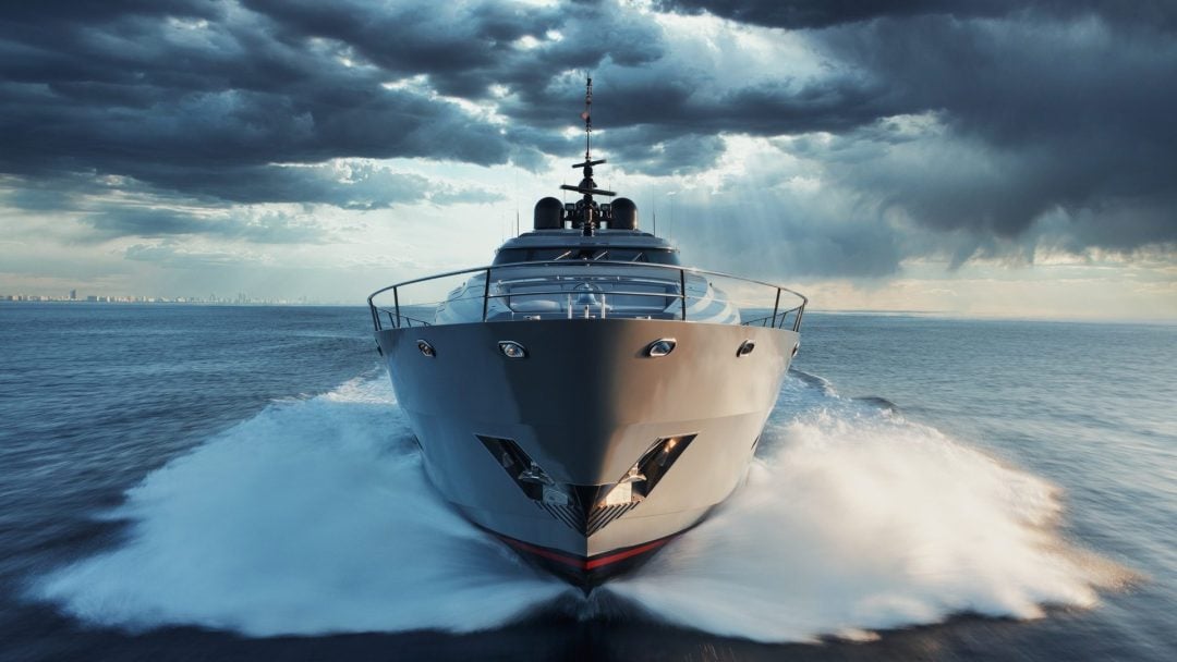 Professional luxury yacht photography of Palmer Johnson motor yacht showcasing sleek design and lines in open water