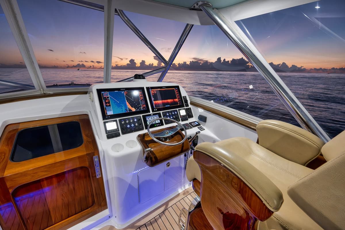 Yacht cockpit photography showing helm station controls and captain's view for brokerage listing documentation